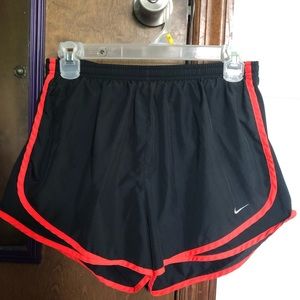 black & orange nike dri-fit shorts